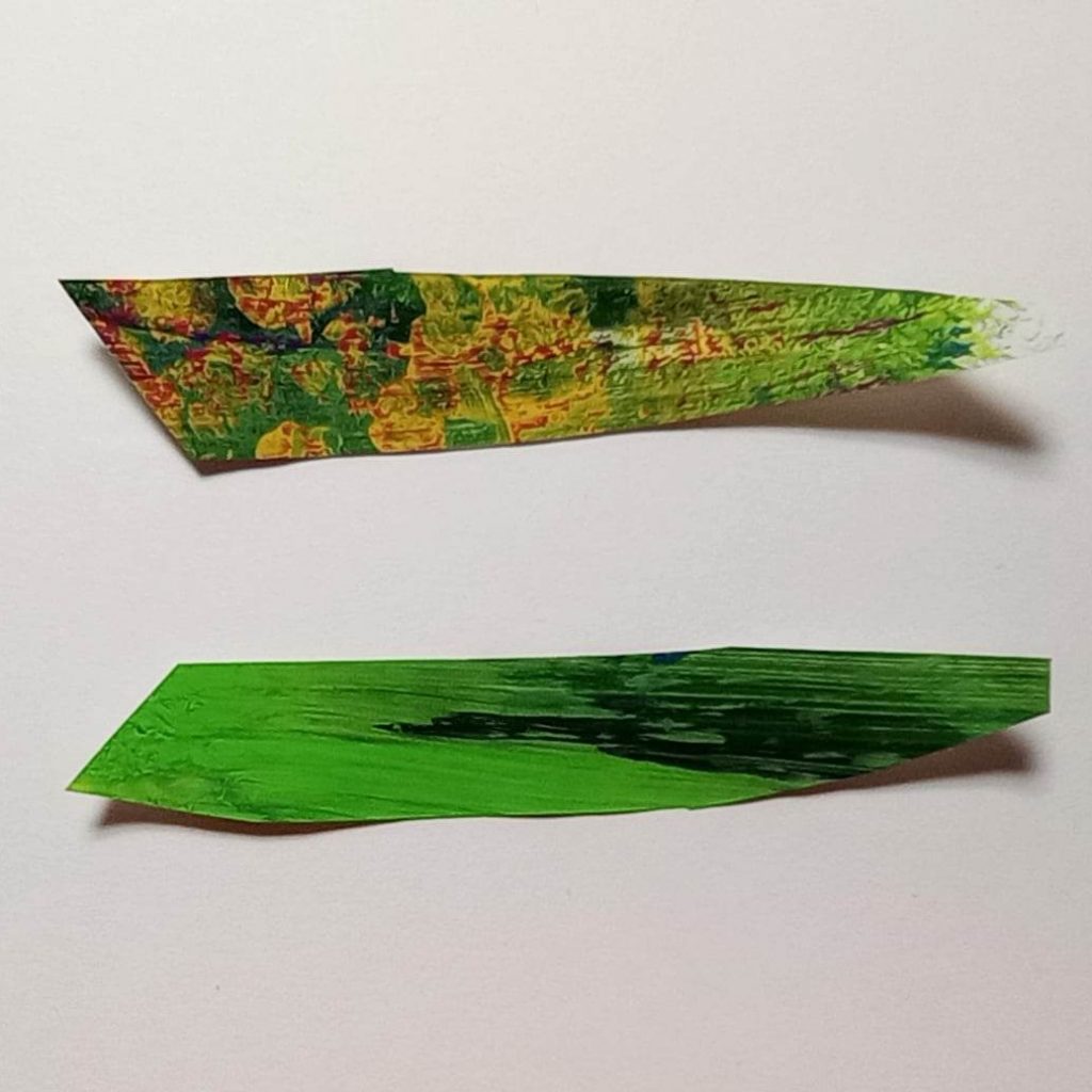 Top and bottom pieces of the body of my cut-paper fish. In greens, with yellow and magenta.
